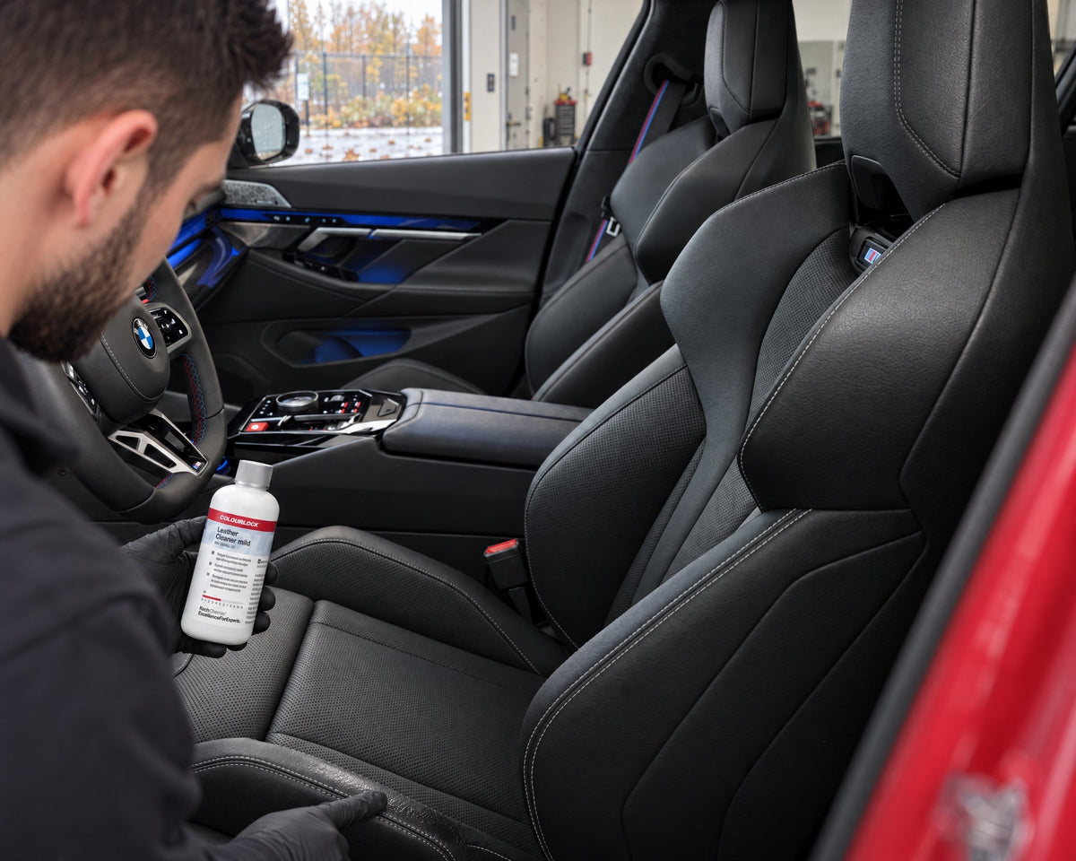 Detailing1 BMW leather care — greasy shine on the seat bolster of a BMW M5, Daniel with COLOURLOCK Leather Cleaner (Mild)